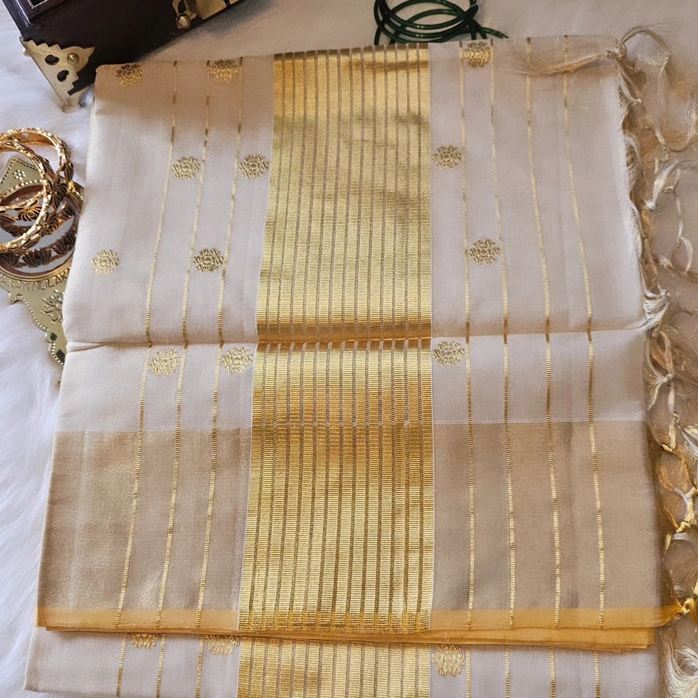 Elegant Gold and Cream Tissue Saree. Perfect For Onam And Vishu